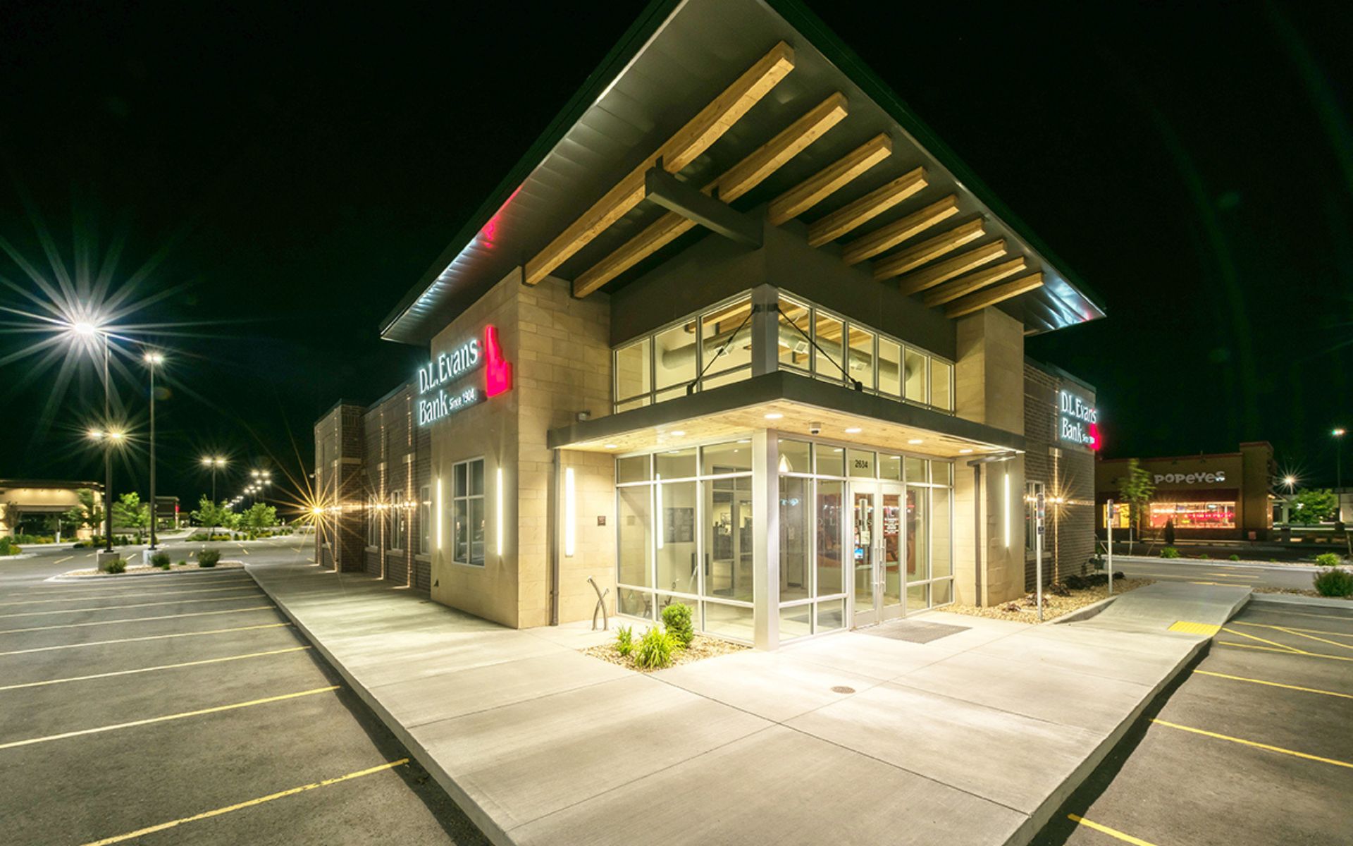Exterior of D.L. Evans bank showcasing exterior lighting