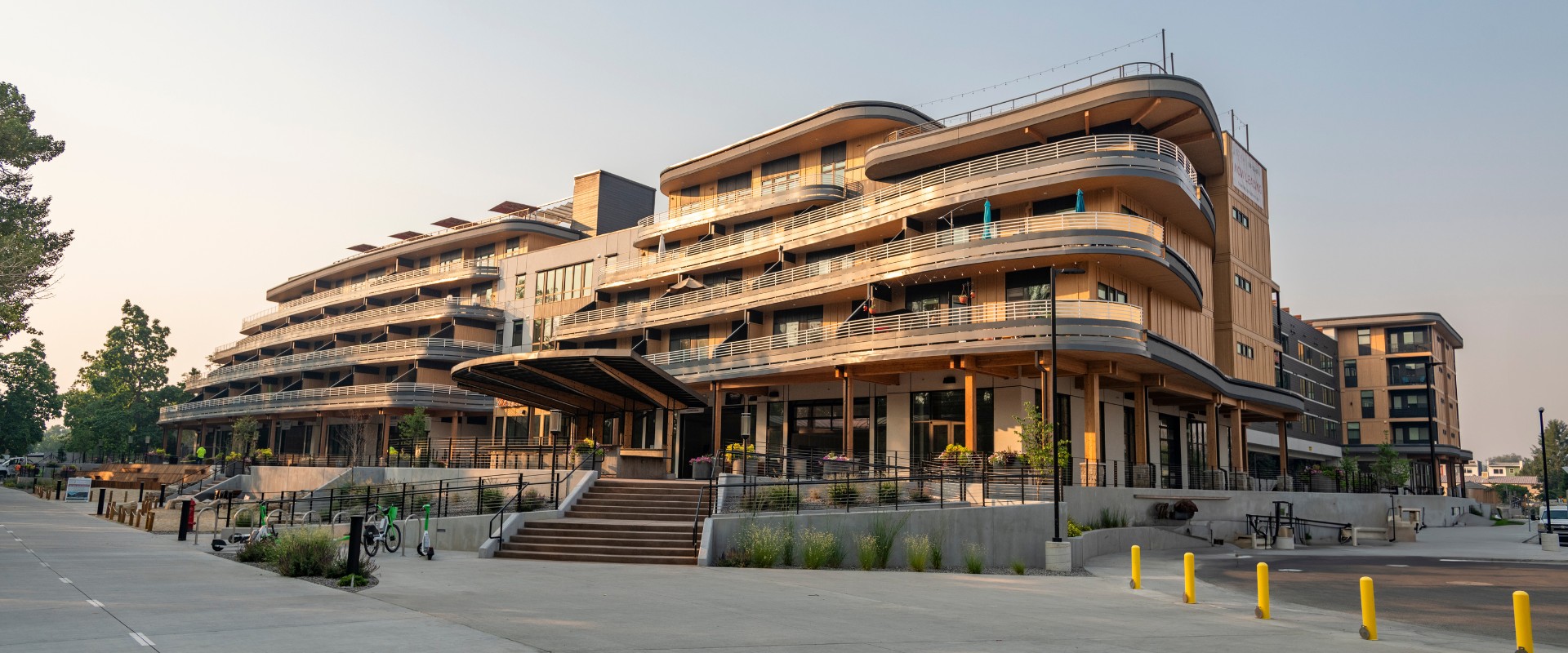 Exterior of Boardwalk Apartments showcasing Greenbelt and balcony's